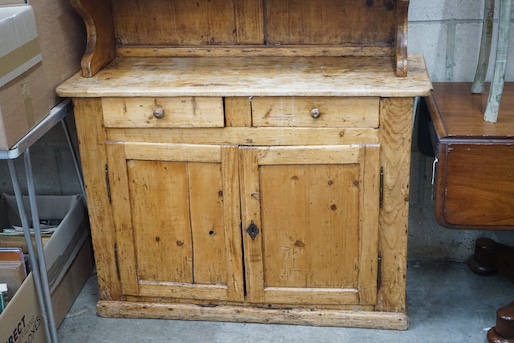 An 18th century and later French provincial pine dresser, width 114cm, depth 44cm, height 195cm